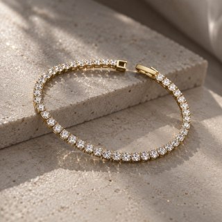 Bransoletka na rękę stal chirurgiczna pozłacana 14k złotem, tenisowa cyrkonie 4mm białe BST1804